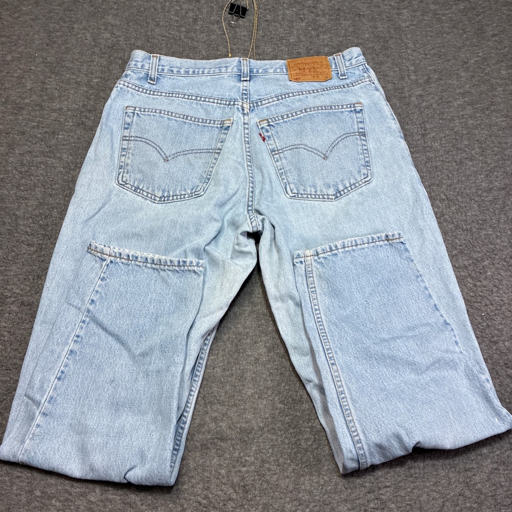 Vintage Levi's 560 Loose Fit Tapered Leg Jeans Mens 36x32 Light Wash Distressed
